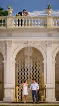 A romantic engagement session set in the beautiful landscapes of Longwood Gardens with the couple holding hands.
