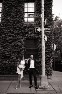 bride and groom standing on the street