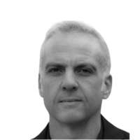	•	“Black and white portrait of John E. Folan, a middle-aged man with short, graying hair. He has a serious expression and is looking directly at the camera.”