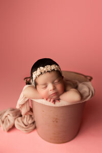 baby in pink bucket for phoenix-newborn-session