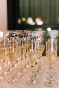 Champagne Flute Escort Cards. Armature Works Wedding. Tampa Wedding Planners. Find a Seat. Take a Seat.