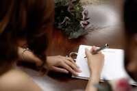 Couple-getting-married-signing-marriage-certificate-posing-for-Intimate-moment-of-couple-posing-for-London-elopement-photographer-021