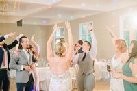 Wedding guests dance the night away at this reception in the Bradford ballroom.