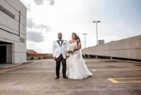 Stylish Black couple on their wedding day in Raleigh, NC, coordinated by a top wedding planner.