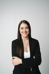 Melody, lead wedding planner at Blush Events in Wichita, Kansas, smiling in professional portrait.