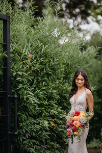 Natural light photograph of bride at Morris Arboretum