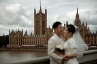 intimate-image-of-couple-cuddling-posing-for-London-elopement-photographer-in-westminster-1046-2