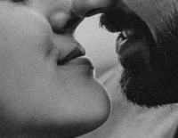 cinematic black and white bride and groom portrait close up