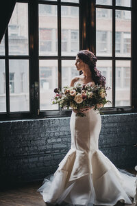 strapless mermaid wedding dress with a petal hem