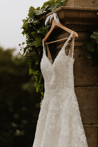 wedding dress hanging outside