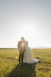 sunset bride and groom portraits in northern colorado taken by Colorado wedding photographers
