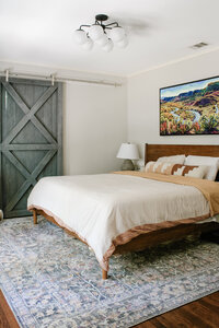 Modern, bright bedroom designed by Hope Miriam Designs in DFW