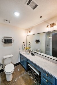 One of the two bathrooms in this downtown Waco vacation rental condo
