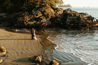 wedding couple on a beach in Tofino at sunset