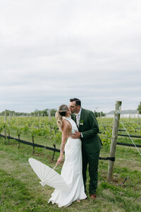 a candid and heartfelt embrace between a young couple at Rittenhouse square. Taken on 35 mm film. 