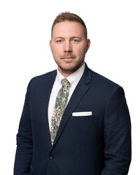 Natural headshot of lawyer at his desk