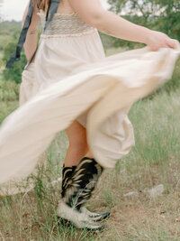 Mikaela Kahn live event vocalist twirling her dress