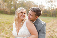 Stunning couple portraits of Mr. + Mrs. captured by Style & Grace Photography in Lincoln County, MO, showcasing their love and joy on their wedding day.