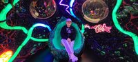 Michelle sitting Meow Wolf Casual Smile