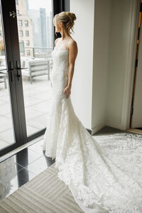 A bride looking out the window