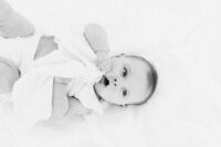 sweet baby girl pulls on her dress