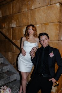 bride and groom pose for couples portraits
