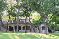 View of Messina Inn's open air reception area from the lawn