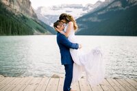 This heartfelt photograph features a couple who eloped at Lake Louise, near the iconic Chateau. In their testimonial for Geoff Wilkings Photography, they express their gratitude for his ability to capture the natural beauty of the surroundings and the emotional essence of their intimate celebration, making their day unforgettable.