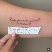 Close up of a delicate fine line tattoo inked by Brooke.