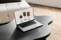 Laptop sitting on coffee table