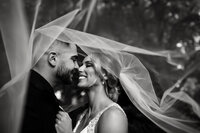 bride and groom on oregon cliff
