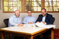 Group photo taken for architecture firm in Logan, Utah at their conference table.