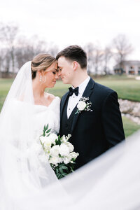 Bride and groom walk up memorial steps at their DC wedding