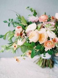 Bouquet of peaches and cream colored flowers