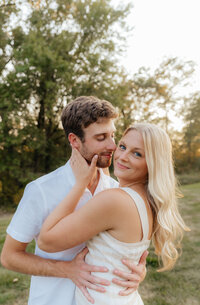 Ohio engagement photographer capturing romantic golden hour portraits for modern couples who love candid, light-filled moments.