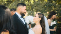 An intimate moment between a bride and groom at their wedding ceremony in Bakersfield, California.
