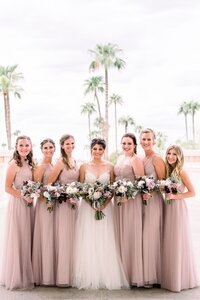 Wedding at Arizona Grand Resort and Spa with Bride and Bridesmaids laughing