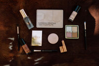  Professional makeup products used for bridal, prom, and event makeup at Boho Glow Studio in Mankato, MN.
