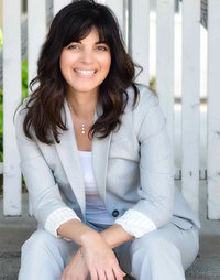 Headshot of a client alongside a testimonial about Erika Fitzgerald’s website copywriting services