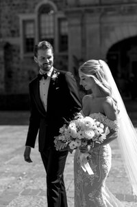 Bride and Groom Editorial Modern Portrait walking in front of Graydon Hall Manor Toronto Wedding Timeless Classic Chic Toronto Wedding Photography | Jacqueline James Photography