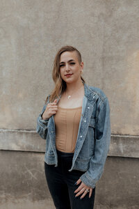 woman in front of wall