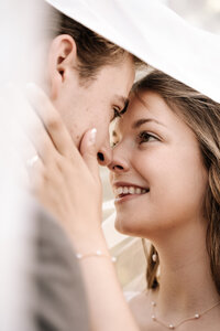 Couple Touching Noses Smiling