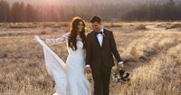 Bride and groom walking in north lake tahoe meadow