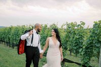 wedding couple walking at morais vineyards and winery in bealton va