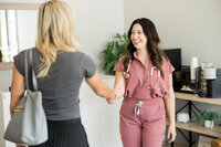 a doctor greeting a patient