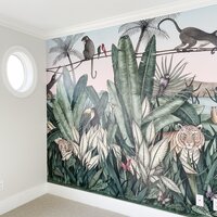 Vibrant Mural of a Jungle with Tiger, Monkeys, Birds, and Round White Trimmed Window