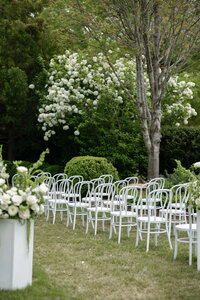 whimsical outdoor wedding ceremony set up