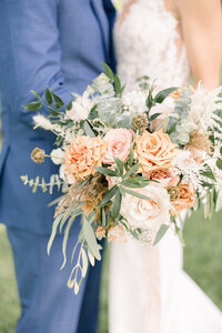 Green and white bud vase wedding centerpiece