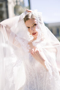 wedding editorial bride with veil covering her face at aldrich mansion in rhode island 