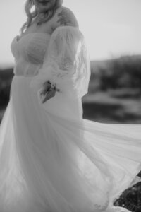 couple dances on sand dunes